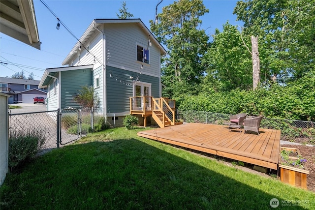 3755 Cyprus Way, Ferndale, WA 98248 - rear view of house featuring french doors, a wooden deck, and a gate