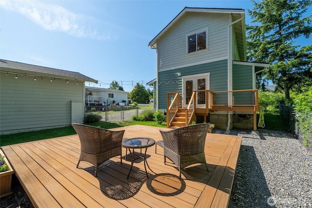 3755 Cyprus Way, Ferndale, WA 98248 - deck with a fenced backyard, french doors, and stairs