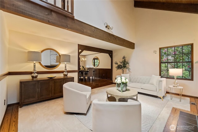 21102 31st Ave SE, Bothell, WA 98021 - living area featuring a high ceiling, beam ceiling, and light wood-style floors