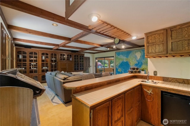 21102 31st Ave SE, Bothell, WA 98021 - kitchen with tile counters, dishwasher, a sink, brown cabinetry, and beam ceiling