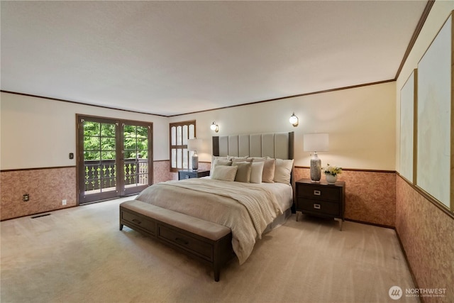 21102 31st Ave SE, Bothell, WA 98021 - bedroom featuring wainscoting, light colored carpet, access to outside, and ornamental molding