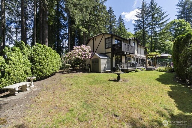21102 31st Ave SE, Bothell, WA 98021 - view of green lawn with a balcony and a deck