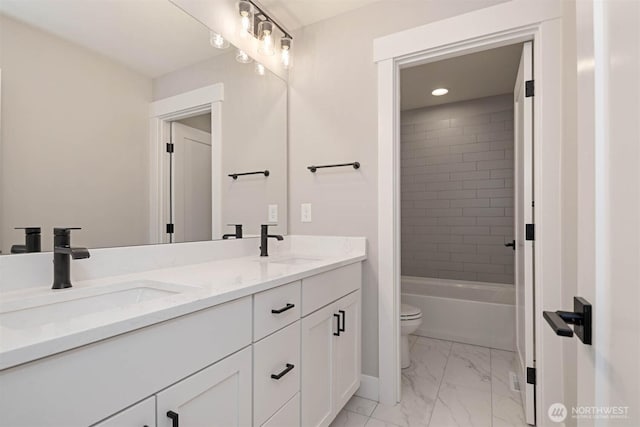 13037 75th Pl S, Seattle, WA 98178 - full bath with double vanity, toilet, marble finish floors, baseboards, and recessed lighting