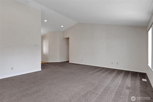 1210 24th St SE, Auburn, WA 98002 - carpeted empty room featuring lofted ceiling, baseboards, and recessed lighting