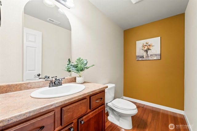 4492 Fantail Pl SW, Port Orchard, WA 98367 - bathroom featuring wood finished floors, vanity, toilet, and baseboards