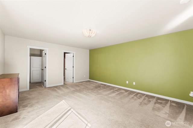 4492 Fantail Pl SW, Port Orchard, WA 98367 - unfurnished bedroom featuring carpet flooring, baseboards, and a spacious closet