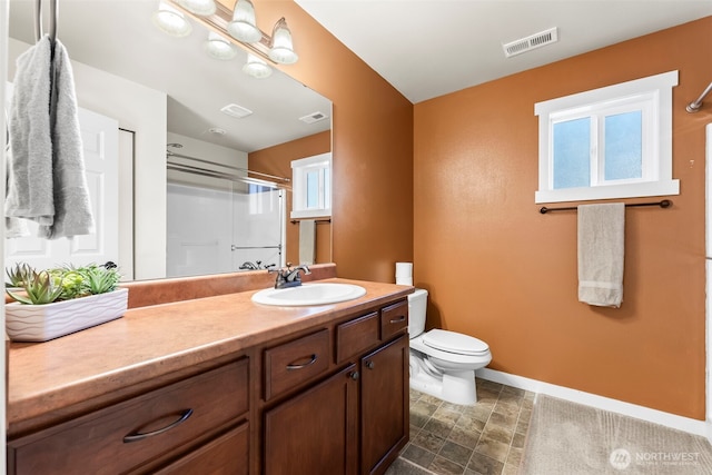 4492 Fantail Pl SW, Port Orchard, WA 98367 - bathroom with toilet, vanity, curtained shower, and baseboards
