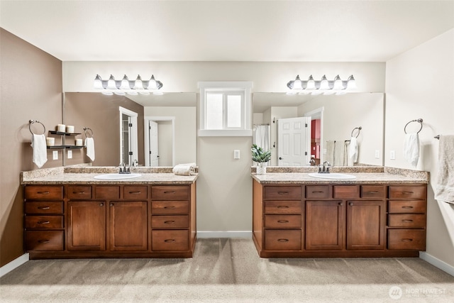4492 Fantail Pl SW, Port Orchard, WA 98367 - bathroom featuring two vanities and baseboards