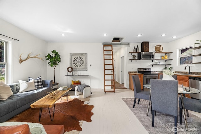 123 5th St, Roslyn, WA 98941 - living room with recessed lighting and light wood-style flooring