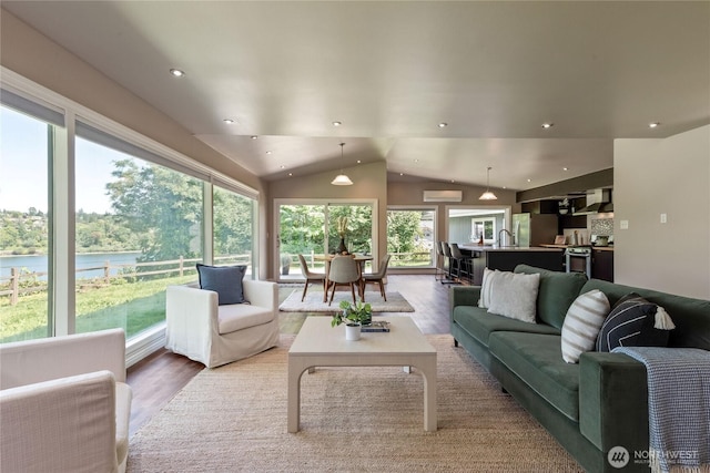 2710 N Lafayette, Bremerton, WA 98312 - living area featuring wood finished floors, recessed lighting, vaulted ceiling, and a water view