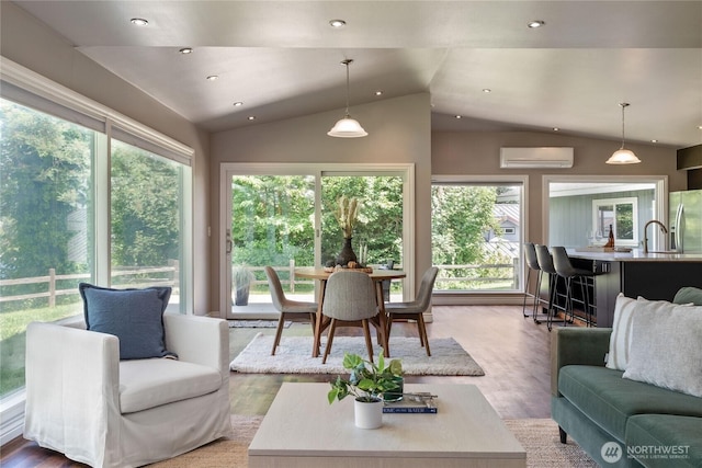2710 N Lafayette, Bremerton, WA 98312 - living room featuring wood finished floors, healthy amount of natural light, lofted ceiling, a wall mounted air conditioner, and recessed lighting