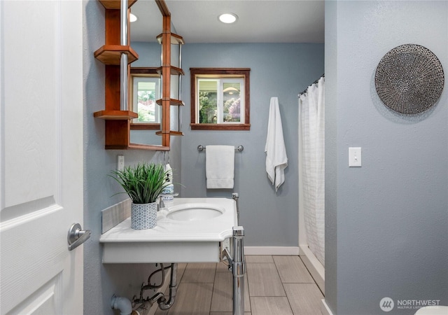 2710 N Lafayette, Bremerton, WA 98312 - bathroom featuring a sink, baseboards, recessed lighting, and a shower with shower curtain