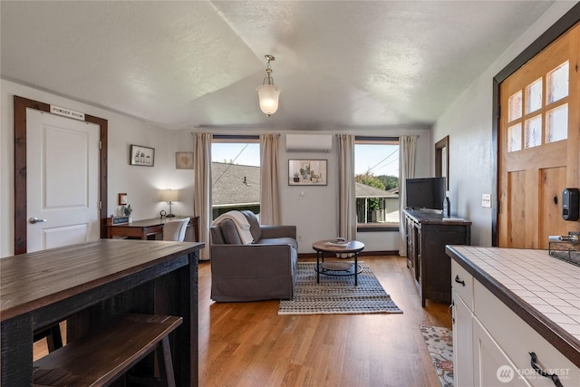 2710 N Lafayette, Bremerton, WA 98312 - living area with light wood-type flooring and an AC wall unit