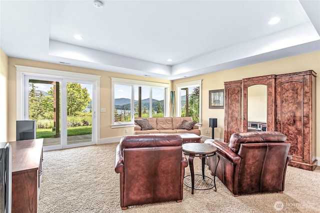 3178 Edgewood Ln, Bellingham, WA 98226 - living area with light colored carpet, a tray ceiling, baseboards, recessed lighting, and a mountain view