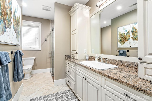 3178 Edgewood Ln, Bellingham, WA 98226 - bathroom featuring vanity, a shower stall, toilet, and baseboards