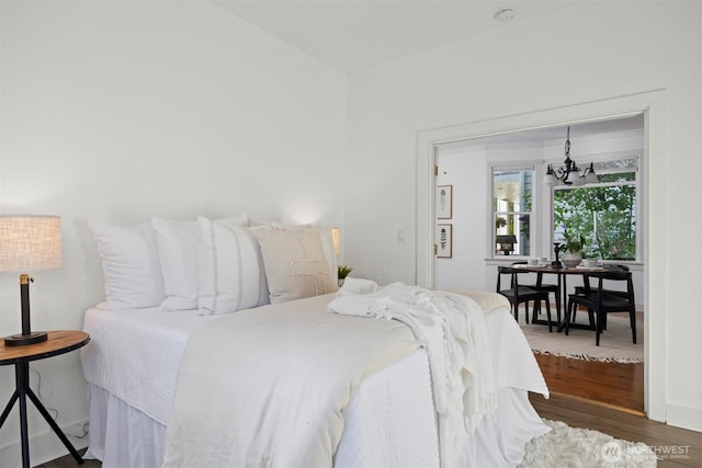 2416 Broadway, Bellingham, WA 98225 - bedroom with a chandelier and wood finished floors