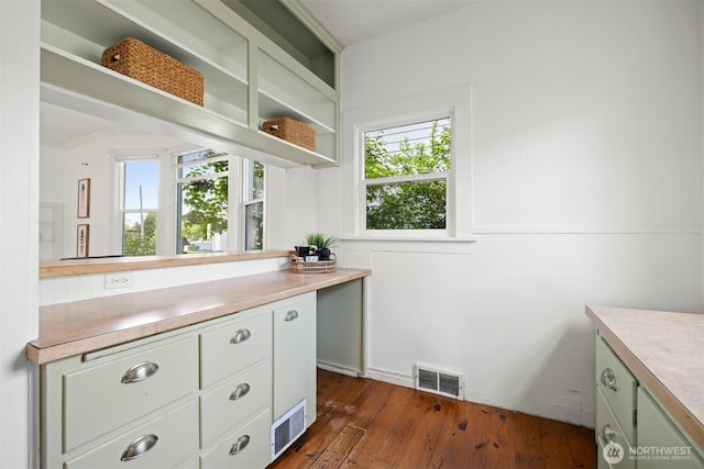 2416 Broadway, Bellingham, WA 98225 - kitchen featuring light countertops, dark wood-type flooring, and open shelves
