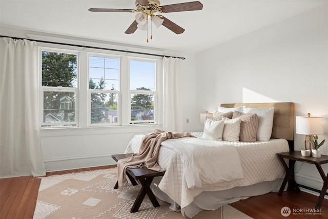 2416 Broadway, Bellingham, WA 98225 - bedroom with multiple windows, wood finished floors, and ceiling fan