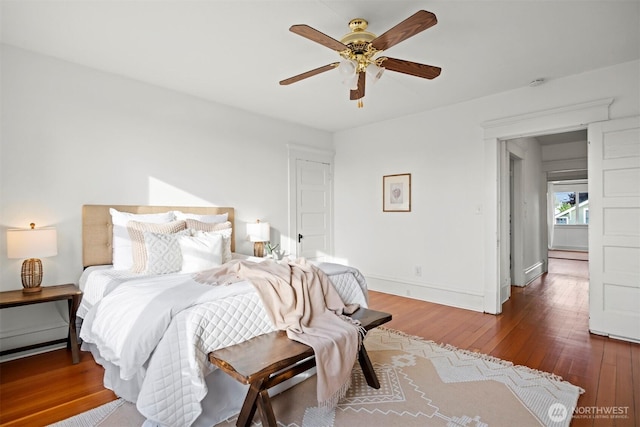 2416 Broadway, Bellingham, WA 98225 - bedroom with wood-type flooring, baseboards, and a ceiling fan