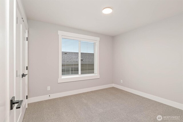 9513 38th St E, Edgewood, WA 98371 - carpeted empty room with baseboards
