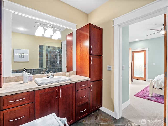 4590 E State Route 106, Union, WA 98592 - bathroom with a shower stall, vanity, baseboards, and a ceiling fan
