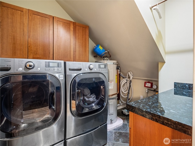 4590 E State Route 106, Union, WA 98592 - washroom featuring separate washer and dryer, cabinet space, and electric water heater