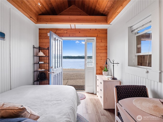 4590 E State Route 106, Union, WA 98592 - bedroom featuring wooden ceiling, light wood-type flooring, a water view, wooden walls, and a raised ceiling