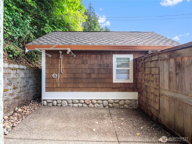4590 E State Route 106, Union, WA 98592 - view of side of property featuring a shingled roof and an outdoor structure