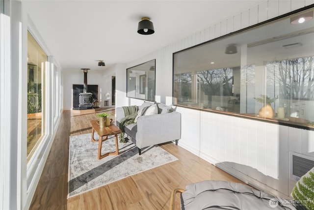 2553 Mackenzie Rd, Bellingham, WA 98226 - sunroom / solarium featuring a wood stove