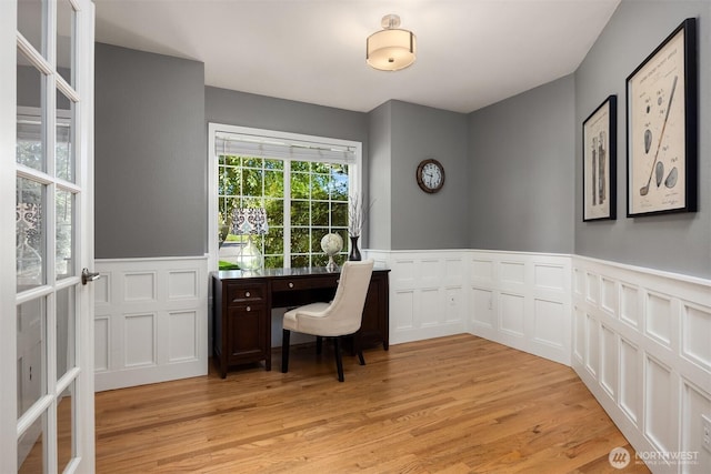 20160 Bue Rund Loop NE, Poulsbo, WA 98370 - office featuring light wood finished floors, a wainscoted wall, and a decorative wall