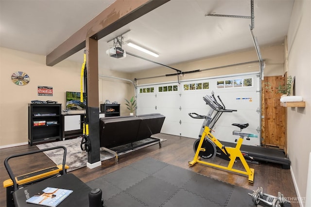 20160 Bue Rund Loop NE, Poulsbo, WA 98370 - workout area with wood finished floors, a garage, and baseboards
