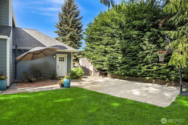 20160 Bue Rund Loop NE, Poulsbo, WA 98370 - view of grassy yard featuring a patio area