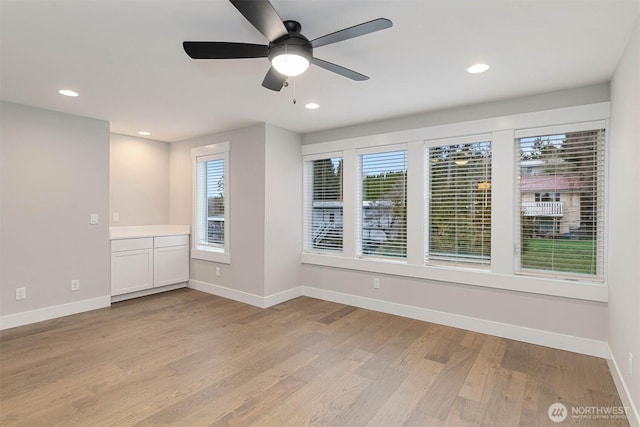 7545 S 129th Pl, Seattle, WA 98178 - empty room featuring a ceiling fan, light wood finished floors, baseboards, and recessed lighting