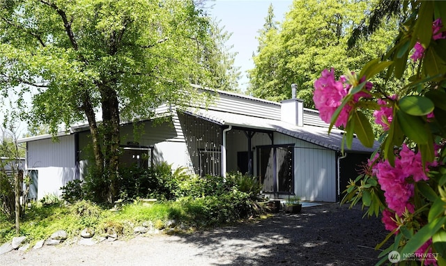 463 Humble Hill Rd, Sequim, WA 98382 - back of house with a chimney