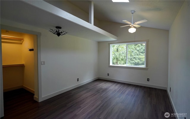 463 Humble Hill Rd, Sequim, WA 98382 - empty room featuring dark wood finished floors, baseboards, lofted ceiling, and a ceiling fan