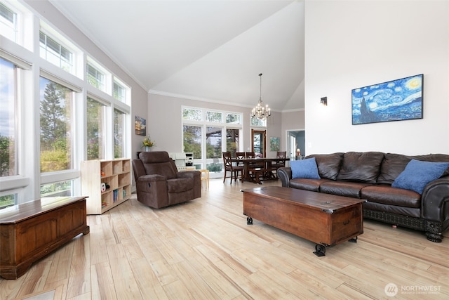 190 Twin Peaks Rd, Selah, WA 98942 - living area featuring high vaulted ceiling, a chandelier, light wood-style floors, and ornamental molding