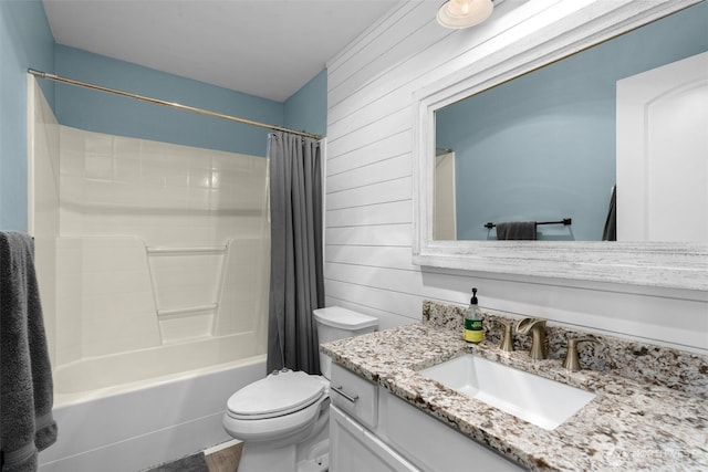 3007 Belmonte Ln, Everett, WA 98201 - full bathroom featuring vanity, toilet, shower / bath combo, wooden walls, and wood finished floors