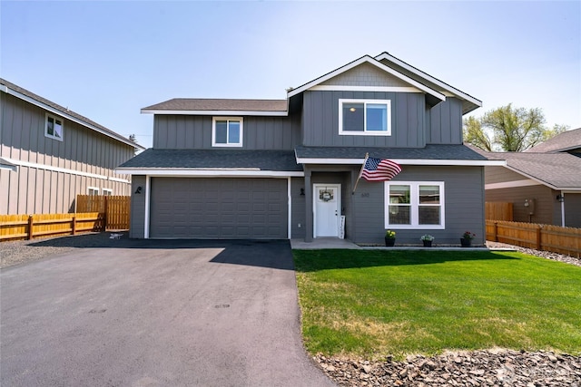 610 Laura Ln, Ellensburg, WA 98926 - view of front of home with driveway, a garage, and board and batten siding