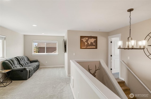 610 Laura Ln, Ellensburg, WA 98926 - hall with light carpet, baseboards, and recessed lighting