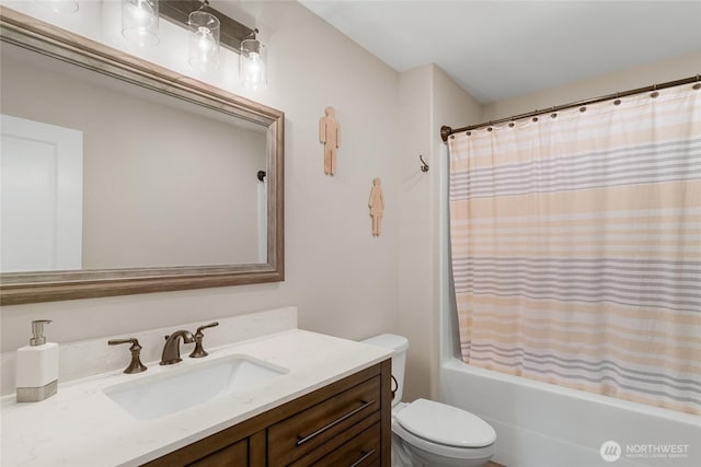 610 Laura Ln, Ellensburg, WA 98926 - bathroom with toilet, vanity, and shower / bathtub combination with curtain