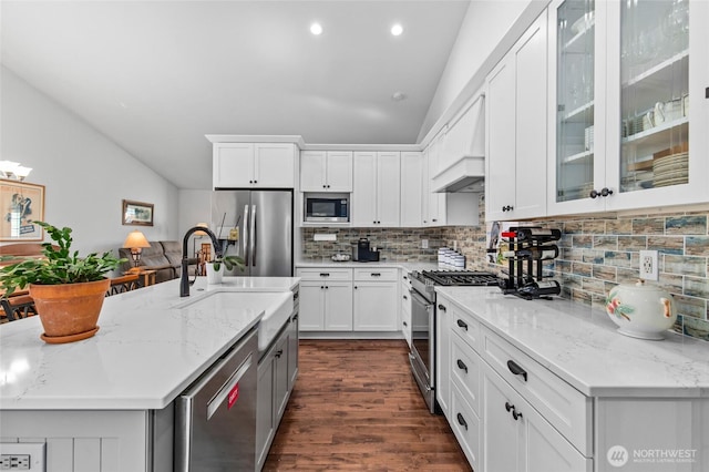 3016 97th Pl SE, Everett, WA 98208 - kitchen with appliances with stainless steel finishes, backsplash, dark wood-style flooring, white cabinetry, and recessed lighting