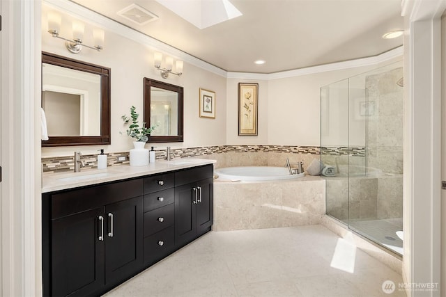 221 5th Ave S Unit E303, Kirkland, WA 98033 - bathroom with a bath, double vanity, a shower stall, tile patterned flooring, and ornamental molding