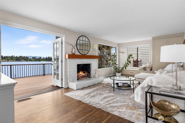 26736 138th Pl SE, Kent, WA 98042 - living area featuring wood finished floors and a fireplace