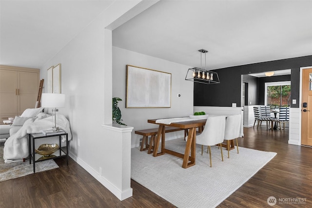 26736 138th Pl SE, Kent, WA 98042 - dining room featuring dark wood-type flooring, baseboards, and a chandelier