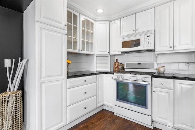 26736 138th Pl SE, Kent, WA 98042 - kitchen with white appliances, dark countertops, glass insert cabinets, decorative backsplash, and recessed lighting