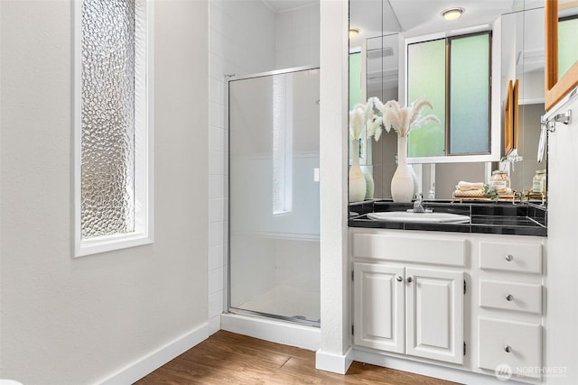 26736 138th Pl SE, Kent, WA 98042 - full bath featuring a shower stall, wood finished floors, vanity, and baseboards