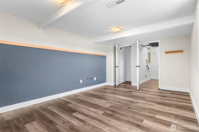 26736 138th Pl SE, Kent, WA 98042 - unfurnished bedroom with baseboards, beamed ceiling, and wood finished floors