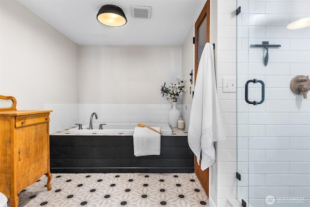 26736 138th Pl SE, Kent, WA 98042 - bathroom with a garden tub, a stall shower, a sink, and tile patterned flooring