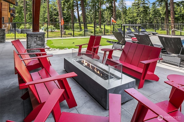 501 Maple Leaf Loop, Cle Elum, WA 98922 - view of patio featuring a putting area, a fire pit, and view of scattered trees