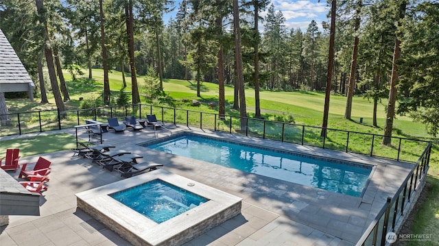 501 Maple Leaf Loop, Cle Elum, WA 98922 - view of swimming pool featuring an in-ground hot tub, a patio area, and golf course view